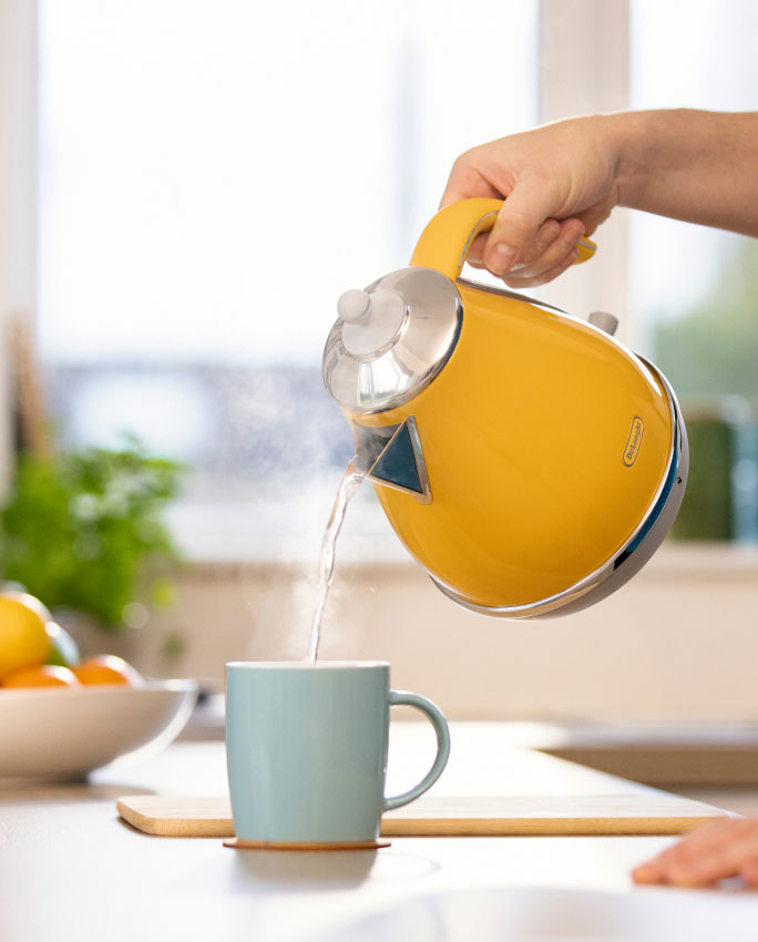 pouring water from kettle